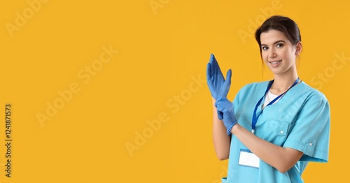 Female nurse putting on med...