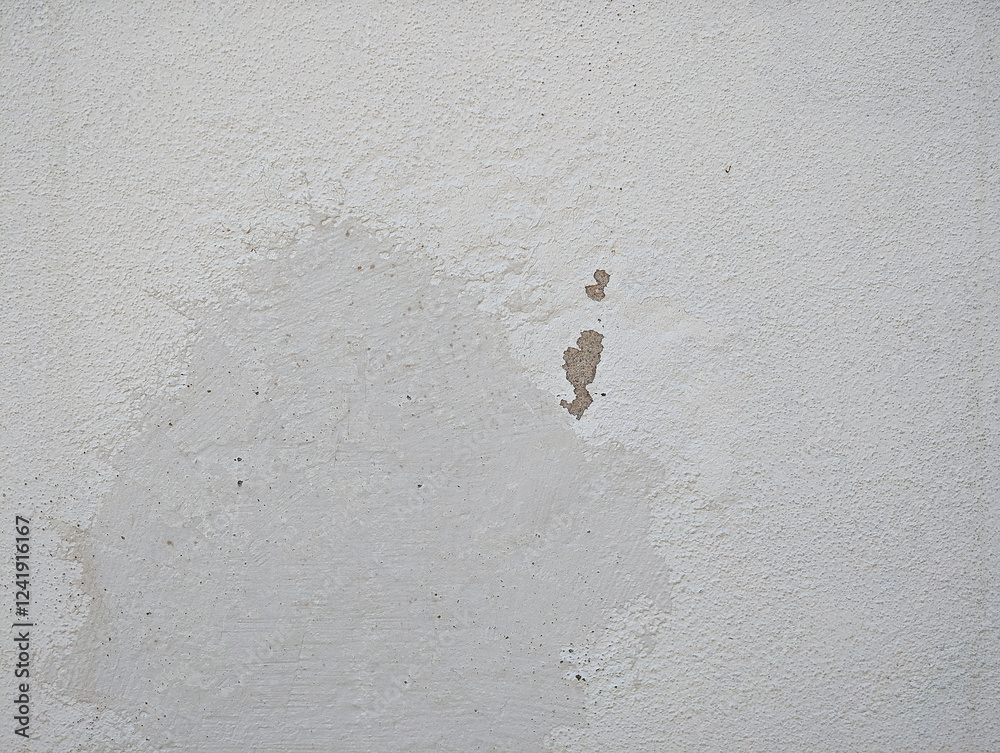 Damaged white wall texture close-up with peeling paint and exposed plaster. Textured surface, irregular damage patterns, effects of wear, moisture, deterioration, aging on interior and exterior walls. Damaged white wall texture close-up with peeling paint and exposed plaster. Textured surface, irregular damage patterns, effects of wear, moisture, deterioration, aging on interior and exterior walls.