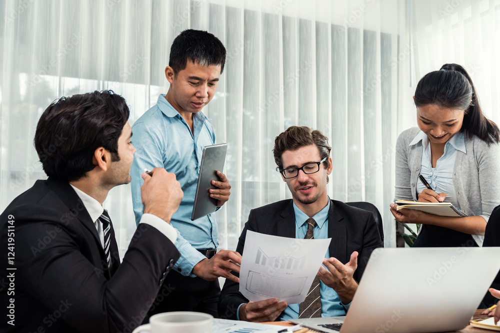Diverse of business people from various ethnic group working in modern office environment. Productive and multi ethnic office workers engage in discussion for strategic business marketing. Meticulous Diverse of business people from various ethnic group working in modern office environment. Productive and multi ethnic office workers engage in discussion for strategic business marketing. Meticulous