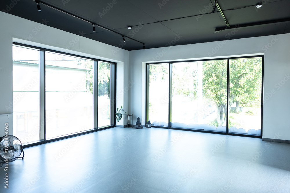 Fototapeta premium Modern apartment with big windows empty interior space designed in minimalism