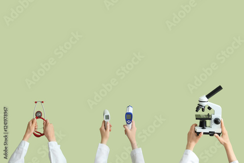 Female hands with microscop...