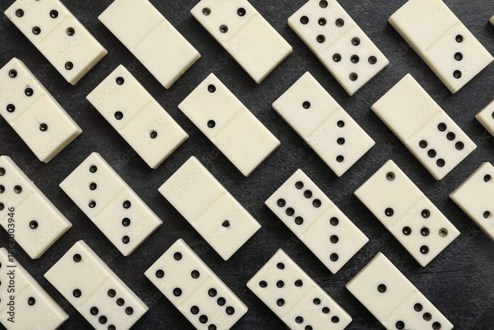 White dominos blocks on black background White dominos blocks on black background