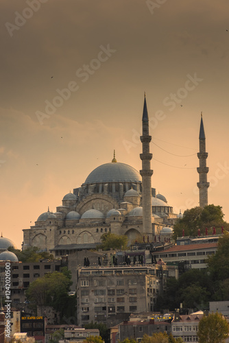 View of Yeni Cami Mosque at sunset,  Istanbul, Turkey photo