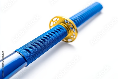 Tsuka : Japanese sword handle wrapped with navy silk cord on white ray skin, isolated with selective focus on a white background photo