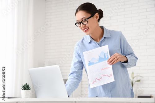 Smiling young businesswoman...