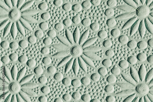 abstract embossed paper floral pattern in seafoam green