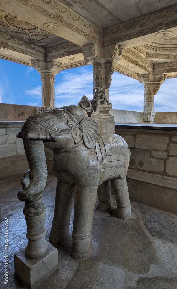 A sculpture of an elephant and the queen in marble on a bright day, Udaipur, India