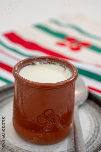 Basque sheep’s milk curd dessert Mamia or Cuajada, Curd, maman, gatzatua or gaztanbera Original Basque Dessert curdled with rennet photo