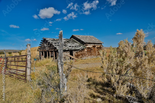 USA, Utah, Woodruff. Old wooden abandoned homestead along highway 39 photo