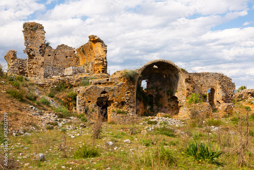 Remains of Anemurium basilica with view of semicircular apse. Close to modern Turkish city of Anamur. photo