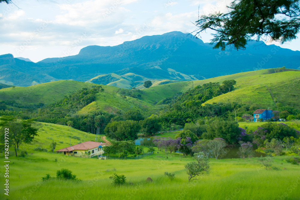 Rolling green hills with mountains in the background, Cruzeiro, Brazil Rolling green hills with mountains in the background, Cruzeiro, Brazil