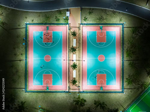 Aerial top view from flying drone of the basketball field