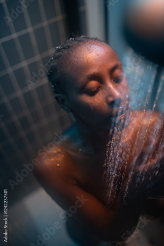 Woman enjoying hot shower
