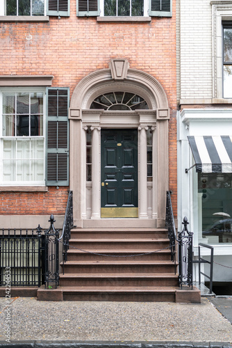 Elegant entrance of a historic building in new york city photo