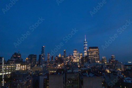 Wallpaper Mural Manhattan in night lights at night blue sky Torontodigital.ca