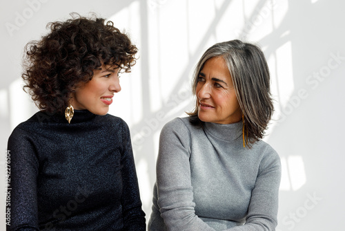 Engaging conversation between two women  photo