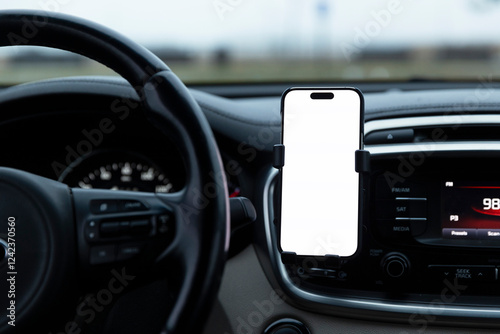 Blank Screen mobile phone in automobile holder  photo