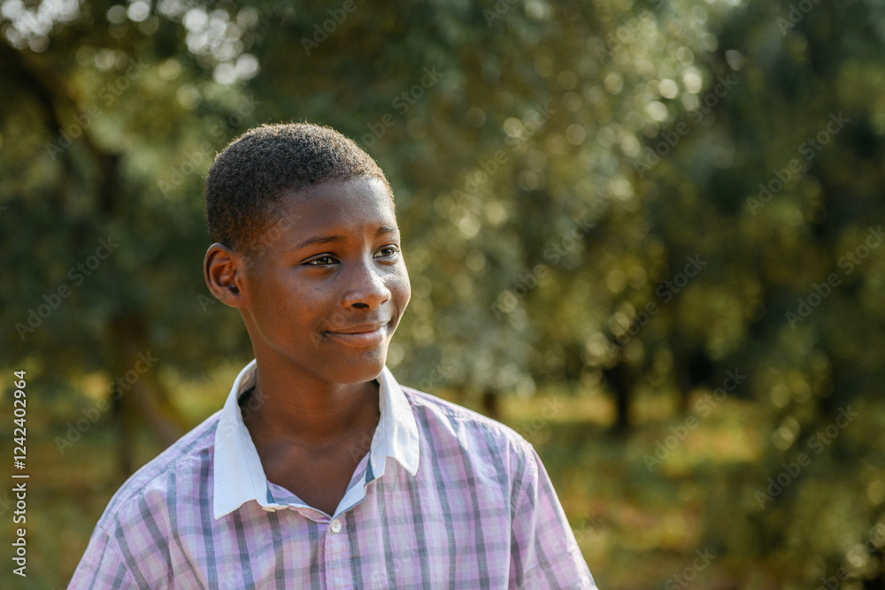 Smiling black teenager portrait outdoors Smiling black teenager portrait outdoors