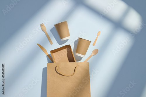 Sustainable Packaging with Biodegradable Cups, Cutlery, and Paper photo