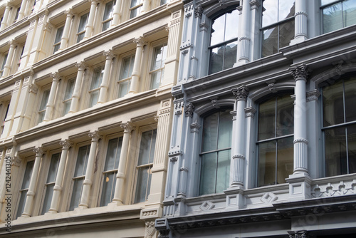 Yellow and grey windows on a building facade in Manhattan  photo