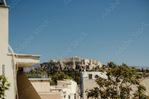 Acropolis in Athens under a clear summer sky photo