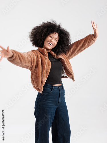Smiling Woman Expressing Joyful Energy in Stylish Modern Clothing