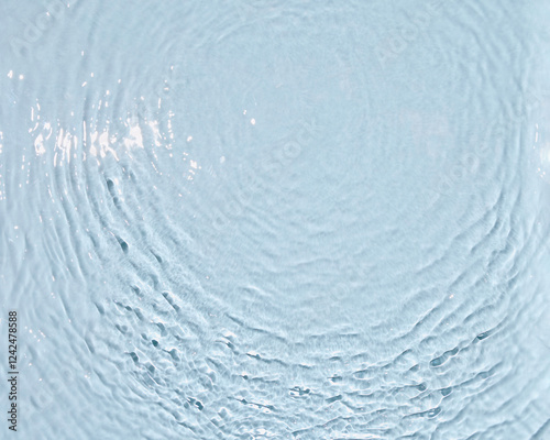 Rippling surface of clear aqua water