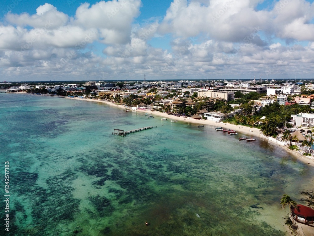Fototapeta premium Aerial view of Cancun's coastal cityscape.