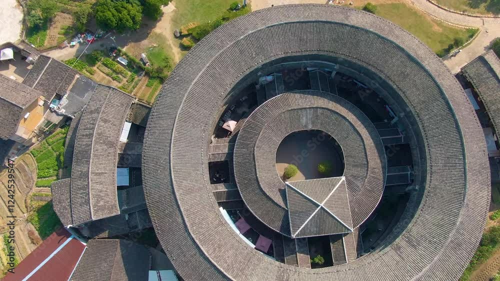4k aerial video of unique circular architecture in Fujian province showcasing traditional tulou homes 4k aerial video of unique circular architecture in Fujian province showcasing traditional tulou homes