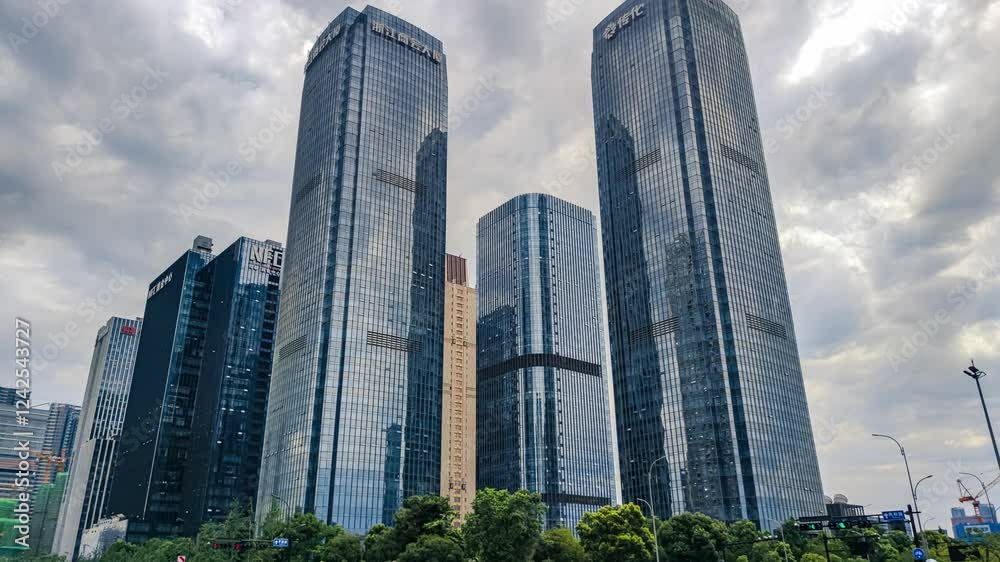 4k aerial video capturing modern skyscrapers in a bustling urban environment with dramatic clouds above 4k aerial video capturing modern skyscrapers in a bustling urban environment with dramatic clouds above