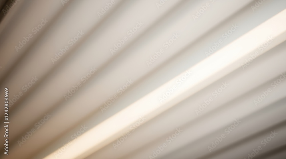 Fototapeta premium Interesting interplay of light and shadow from modern ceiling panels in a contemporary office space