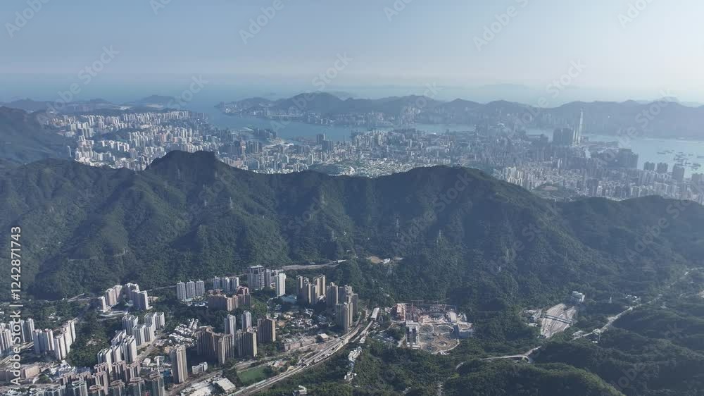 Aerial drone skyview in Sham Shui Po Kowloon Tong Shek Kip Mei Wong Tai Sin Lok Fu Wang Tau Hom San Po Kong Kowloon City Kai Tak Sung Wong Toi residential community near Lion Rock mountain Hong Kong Aerial drone skyview in Sham Shui Po Kowloon Tong Shek Kip Mei Wong Tai Sin Lok Fu Wang Tau Hom San Po Kong Kowloon City Kai Tak Sung Wong Toi residential community near Lion Rock mountain Hong Kong