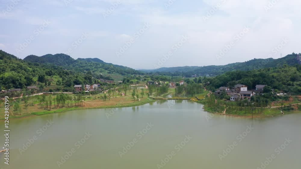4k aerial video showcasing tranquil landscapes and serene lakes in rural countryside with lush greenery and distant hills in daylight 4k aerial video showcasing tranquil landscapes and serene lakes in rural countryside with lush greenery and distant hills in daylight