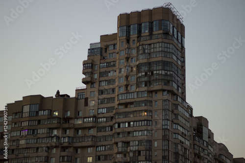 Soviet panel houses near the river, brutalist architecture photo