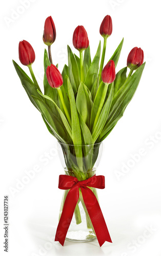 Bukiet tulipanów w wazonie przewiązanym czerwoną wstążka © Blue Pixel
