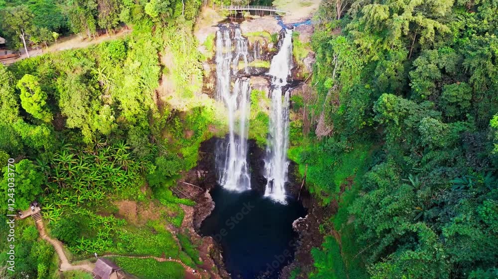 drone approach the taller waterfall in the Pakse bolaven plateau Laos motorcycle loop