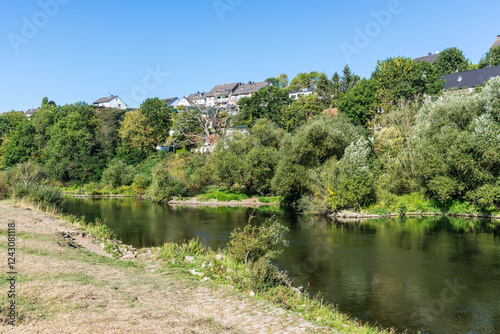 View of the Ruhr river and the surrounding green landscape. Nature on the river near Hattingen in the Ruhr area, Germany.