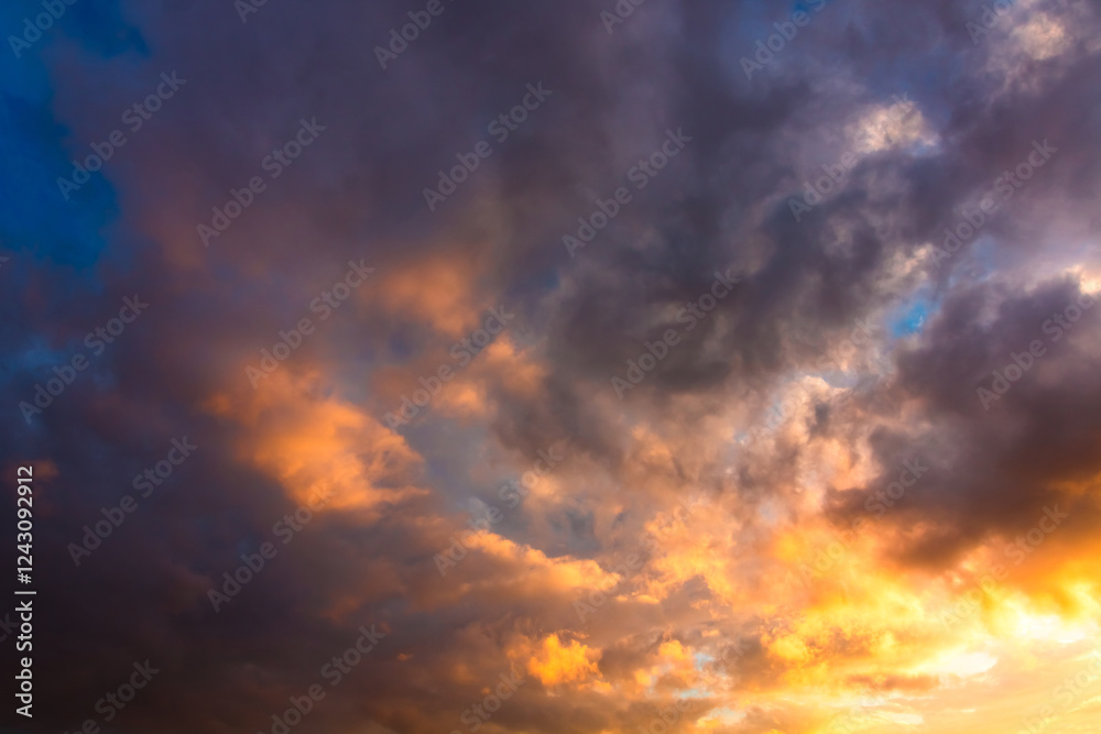 Sunset or sunrise sky. Dramatic clouds at sunset Sunset or sunrise sky. Dramatic clouds at sunset