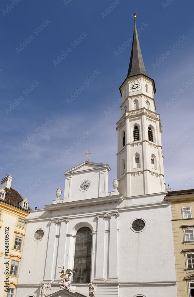 Fototapeta premium St Michel church (Michaelerkirche,) Michaelerplatz, Vienna, Austria