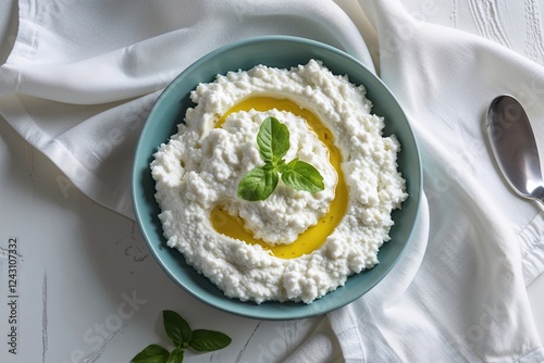 Creamy Ricotta Spread on Crisp White Background Top Down Perspective photo