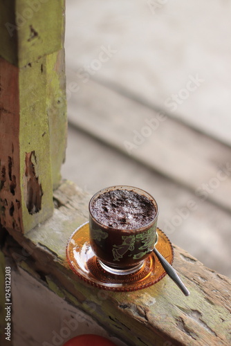 Coffee Sits Perfectly on Rustic Wood with Spoon, Cup, Beverage Perfectly Rustic, Alongside Wood and Spoon
