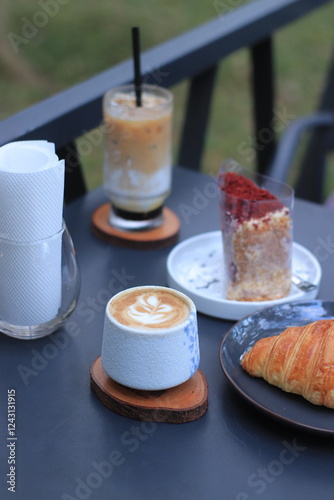 Coffee, Croissant, and Cake: Enjoying a Relaxing Breakfast Outdoors