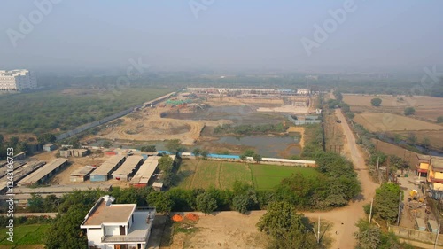 Aerial drone shot capturing a massive construction site in Noida India photo