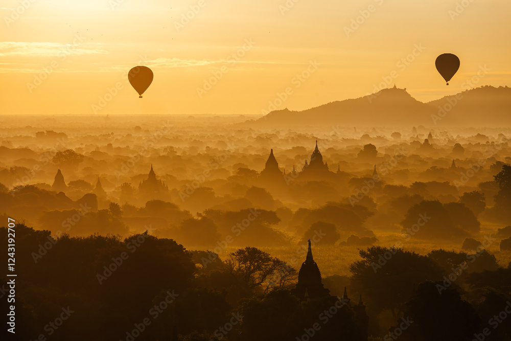 group of ancient pagodas in Bagan at the sunset, myanmar