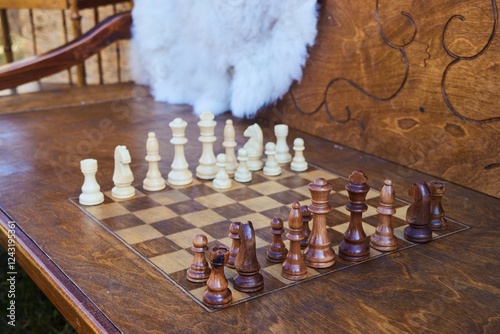 A chessboard carved on a bench. The tradition of the South Caucasian peoples photo
