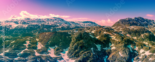 Obraz na płótnie View from above of high mountains ridge in early summer. High mountains nature park in Sauda municipality. The beautiful nature of Norway, Europe w salonie
