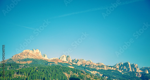 Mountain landscape with clear blue sky on a sunny day. Mountains of the Dolomites. Thought Tyrol, Italy Europe. Horizontal banner