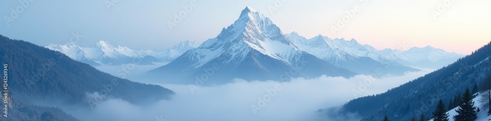 Misty mountain landscape with snow-capped peak, fog, wilderness, snow Misty mountain landscape with snow-capped peak, fog, wilderness, snow
