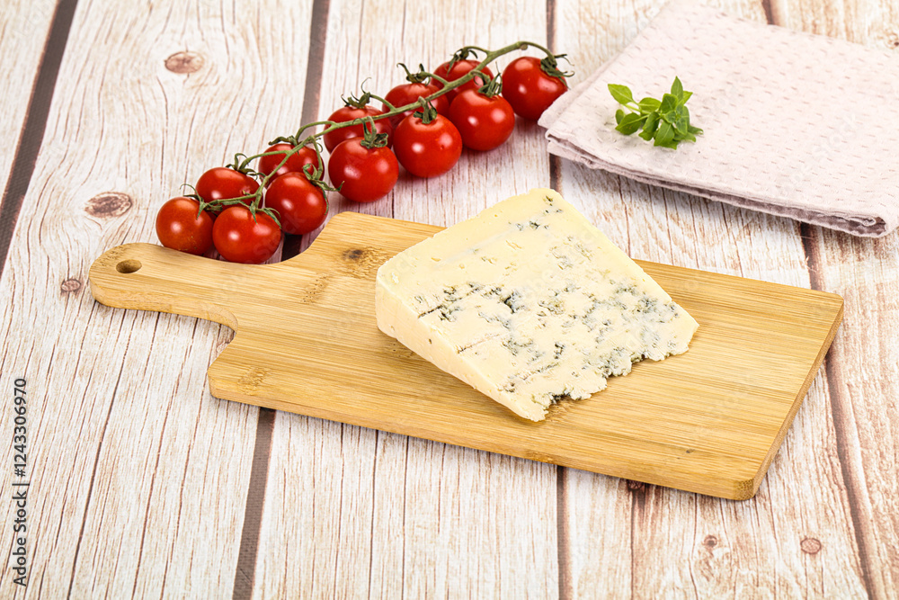 Blue cheese with mold over board Blue cheese with mold over board