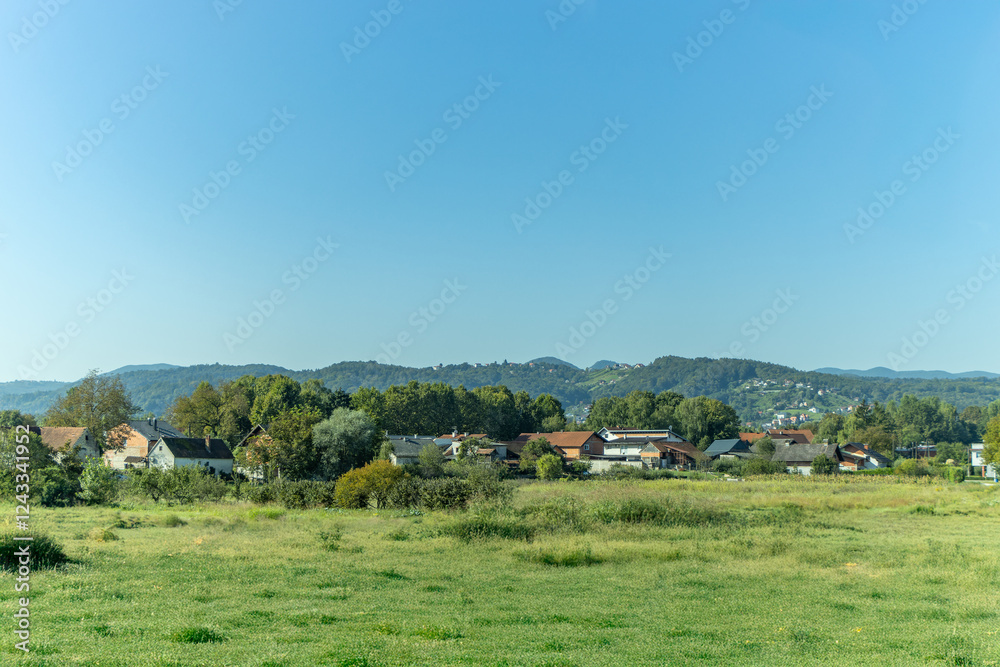 View of beautiful Zumberak mountains, with small, rural houses and agricultural surfaces. Croatia View of beautiful Zumberak mountains, with small, rural houses and agricultural surfaces. Croatia
